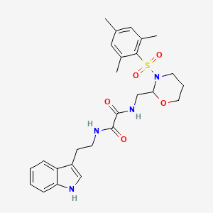 N1-(2-(1H-indol-3-yl)ethyl)-N2-((3-(mesitylsulfonyl)-1,3-oxazinan-2-yl)methyl)oxalamide