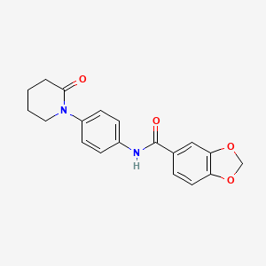 molecular formula C19H18N2O4 B2575424 N-[4-(2-oxopiperidin-1-yl)phenyl]-1,3-benzodioxole-5-carboxamide CAS No. 941918-52-1