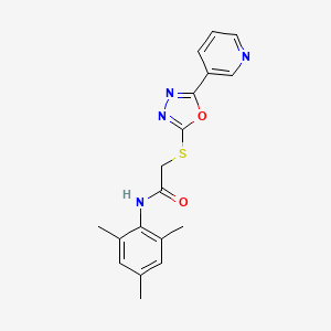 molecular formula C18H18N4O2S B2575454 2-{[5-(pyridin-3-yl)-1,3,4-oxadiazol-2-yl]sulfanyl}-N-(2,4,6-trimethylphenyl)acetamide CAS No. 332930-17-3