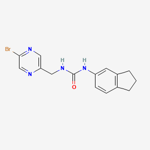molecular formula C15H15BrN4O B2575551 1-[(5-bromopyrazin-2-yl)methyl]-3-(2,3-dihydro-1H-inden-5-yl)urea CAS No. 2094331-79-8