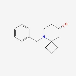 molecular formula C15H19NO B2575883 5-Benzyl-5-azaspiro[3.5]nonan-8-one CAS No. 2344680-14-2