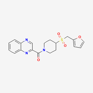 molecular formula C19H19N3O4S B2576072 (4-((Furan-2-ylmethyl)sulfonyl)piperidin-1-yl)(quinoxalin-2-yl)methanone CAS No. 1706334-48-6