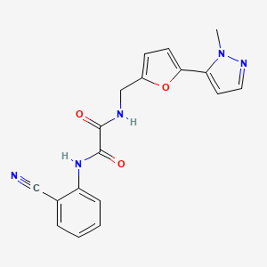 molecular formula C18H15N5O3 B2576679 N'-(2-氰基苯基)-N-[[5-(2-甲基吡唑-3-基)呋喃-2-基]甲基]草酰胺 CAS No. 2415621-25-7