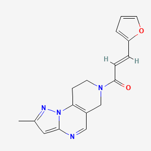 molecular formula C17H16N4O2 B2577447 (E)-3-(Furan-2-yl)-1-(4-methyl-2,3,7,11-tetrazatricyclo[7.4.0.02,6]trideca-1(9),3,5,7-tetraen-11-yl)prop-2-en-1-one CAS No. 1798409-82-1