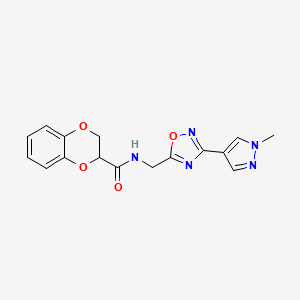 molecular formula C16H15N5O4 B2577543 N-((3-(1-methyl-1H-pyrazol-4-yl)-1,2,4-oxadiazol-5-yl)methyl)-2,3-dihydrobenzo[b][1,4]dioxine-2-carboxamide CAS No. 2034533-37-2