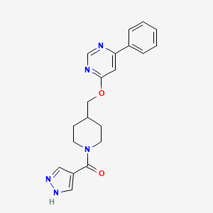 molecular formula C20H21N5O2 B2577728 [4-[(6-Phenylpyrimidin-4-yl)oxymethyl]piperidin-1-yl]-(1H-pyrazol-4-yl)methanone CAS No. 2379977-24-7