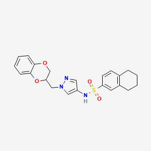 molecular formula C22H23N3O4S B2578295 N-(1-((2,3-dihydrobenzo[b][1,4]dioxin-2-yl)methyl)-1H-pyrazol-4-yl)-5,6,7,8-tetrahydronaphthalene-2-sulfonamide CAS No. 1798514-46-1