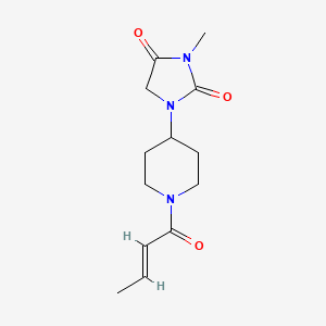 molecular formula C13H19N3O3 B2580073 (E)-1-(1-(but-2-enoyl)piperidin-4-yl)-3-methylimidazolidine-2,4-dione CAS No. 2321331-82-0