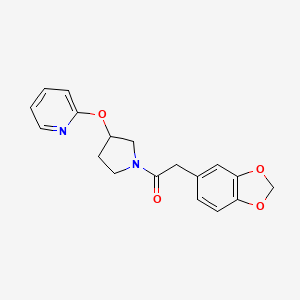 molecular formula C18H18N2O4 B2580541 2-(Benzo[d][1,3]dioxol-5-yl)-1-(3-(pyridin-2-yloxy)pyrrolidin-1-yl)ethanone CAS No. 1903032-23-4