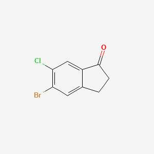 molecular formula C9H6BrClO B2580783 5-Bromo-6-chloro-2,3-dihydro-1H-inden-1-one CAS No. 1260018-10-7