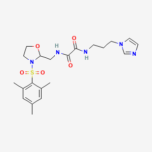 N1-(3-(1H-imidazol-1-yl)propyl)-N2-((3-(mesitylsulfonyl)oxazolidin-2-yl)methyl)oxalamide