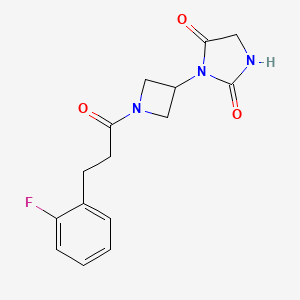 molecular formula C15H16FN3O3 B2580962 3-(1-(3-(2-氟苯基)丙酰)氮杂环丙烷-3-基)咪唑烷-2,4-二酮 CAS No. 2034310-21-7