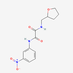 molecular formula C13H15N3O5 B2581049 N1-(3-nitrophenyl)-N2-((tetrahydrofuran-2-yl)methyl)oxalamide CAS No. 941945-90-0