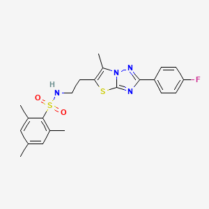 molecular formula C22H23FN4O2S2 B2581447 N-(2-(2-(4-fluorophenyl)-6-methylthiazolo[3,2-b][1,2,4]triazol-5-yl)ethyl)-2,4,6-trimethylbenzenesulfonamide CAS No. 896278-17-4