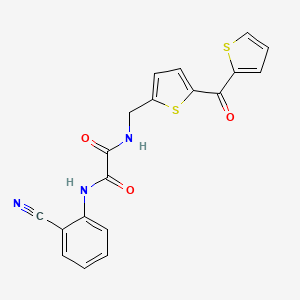 molecular formula C19H13N3O3S2 B2581588 N1-(2-cyanophenyl)-N2-((5-(thiophene-2-carbonyl)thiophen-2-yl)methyl)oxalamide CAS No. 1797546-69-0