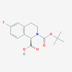 molecular formula C15H18FNO4 B2581629 (1S)-6-氟-2-[(2-甲基丙烷-2-基)氧羰基]-3,4-二氢-1H-异喹啉-1-羧酸 CAS No. 2490344-70-0