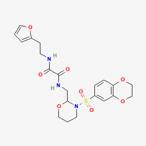 molecular formula C21H25N3O8S B2582374 N1-((3-((2,3-二氢苯并[b][1,4]二氧杂环-6-基)磺酰基)-1,3-氧杂环己烷-2-基)甲基)-N2-(2-(呋喃-2-基)乙基)草酰胺 CAS No. 872881-67-9