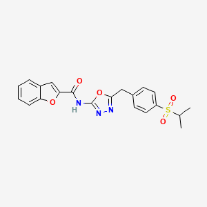 molecular formula C21H19N3O5S B2584475 N-(5-(4-(isopropylsulfonyl)benzyl)-1,3,4-oxadiazol-2-yl)benzofuran-2-carboxamide CAS No. 1171829-35-8