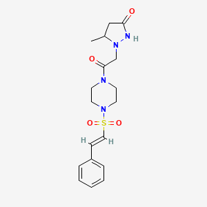 molecular formula C18H24N4O4S B2585323 5-Methyl-1-[2-oxo-2-[4-[(E)-2-phenylethenyl]sulfonylpiperazin-1-yl]ethyl]pyrazolidin-3-one CAS No. 950156-85-1