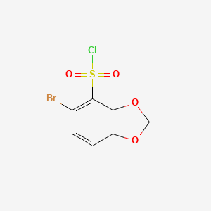molecular formula C7H4BrClO4S B2585672 5-溴-1,3-苯并二氧杂环-4-磺酰氯 CAS No. 2171914-13-7