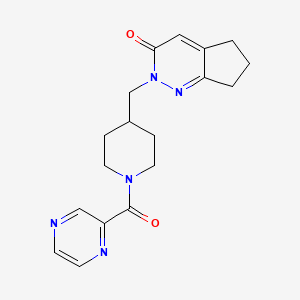 2-{[1-(pyrazine-2-carbonyl)piperidin-4-yl]methyl}-2H,3H,5H,6H,7H-cyclopenta[c]pyridazin-3-one