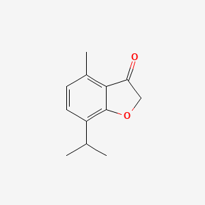 molecular formula C12H14O2 B2587273 4-Methyl-7-(propan-2-yl)-2,3-dihydro-1-benzofuran-3-one CAS No. 100121-58-2