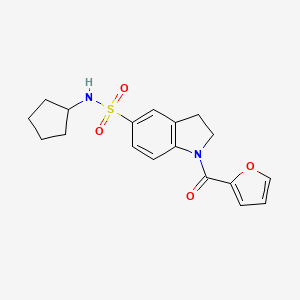 molecular formula C18H20N2O4S B2587698 5-[(Cyclopentylamino)sulfonyl]indolinyl 2-furyl ketone CAS No. 898657-47-1