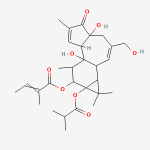 molecular formula C29H40O8 B2587985 [1,6-Dihydroxy-8-(hydroxymethyl)-4,12,12,15-tetramethyl-13-(2-methylpropanoyloxy)-5-oxo-14-tetracyclo[8.5.0.02,6.011,13]pentadeca-3,8-dienyl] 2-methylbut-2-enoate CAS No. 92214-54-5