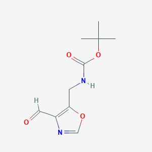 molecular formula C10H14N2O4 B2588279 Tert-butyl N-[(4-formyl-1,3-oxazol-5-yl)methyl]carbamate CAS No. 2375270-59-8
