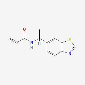 molecular formula C12H12N2OS B2588289 N-[1-(1,3-Benzothiazol-6-yl)ethyl]prop-2-enamide CAS No. 2308161-49-9