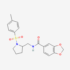 molecular formula C20H22N2O5S B2588546 N-((1-tosylpyrrolidin-2-yl)methyl)benzo[d][1,3]dioxole-5-carboxamide CAS No. 887862-45-5