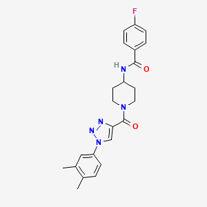 molecular formula C23H24FN5O2 B2588725 N-(1-(1-(3,4-dimethylphenyl)-1H-1,2,3-triazole-4-carbonyl)piperidin-4-yl)-4-fluorobenzamide CAS No. 1251624-93-7