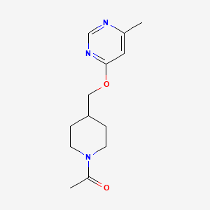 B2589095 1-[4-[(6-Methylpyrimidin-4-yl)oxymethyl]piperidin-1-yl]ethanone CAS No. 2380009-66-3