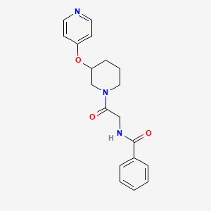 N-(2-oxo-2-(3-(pyridin-4-yloxy)piperidin-1-yl)ethyl)benzamide