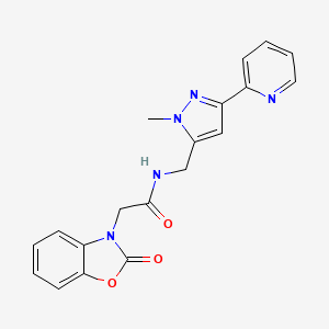 N-{[1-methyl-3-(pyridin-2-yl)-1H-pyrazol-5-yl]methyl}-2-(2-oxo-2,3-dihydro-1,3-benzoxazol-3-yl)acetamide