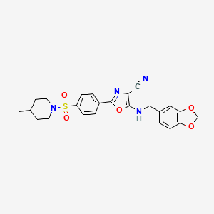 molecular formula C24H24N4O5S B2590366 5-[(1,3-Benzodioxol-5-ylmethyl)amino]-2-{4-[(4-methylpiperidin-1-yl)sulfonyl]phenyl}-1,3-oxazole-4-carbonitrile CAS No. 941000-62-0