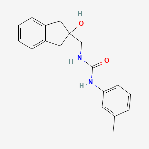 molecular formula C18H20N2O2 B2590413 1-((2-羟基-2,3-二氢-1H-茚满-2-基)甲基)-3-(间甲苯基)脲 CAS No. 2034346-93-3