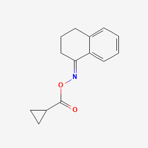molecular formula C14H15NO2 B2591515 N-[(cyclopropylcarbonyl)oxy]-N-[3,4-dihydro-1(2H)-naphthalenyliden]amine CAS No. 383148-86-5