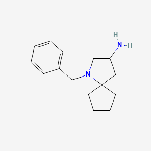 molecular formula C15H22N2 B2592712 1-苄基-1-氮杂螺[4.4]壬烷-3-胺 CAS No. 2243520-79-6