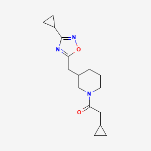 molecular formula C16H23N3O2 B2592811 2-Cyclopropyl-1-(3-((3-cyclopropyl-1,2,4-oxadiazol-5-yl)methyl)piperidin-1-yl)ethanone CAS No. 1705549-40-1