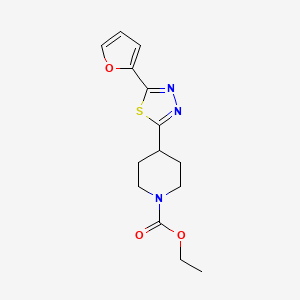 molecular formula C14H17N3O3S B2592868 4-(5-(呋喃-2-基)-1,3,4-噻二唑-2-基)哌啶-1-甲酸乙酯 CAS No. 1226440-21-6