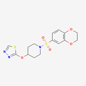 molecular formula C15H17N3O5S2 B2594131 2-((1-((2,3-Dihydrobenzo[b][1,4]dioxin-6-yl)sulfonyl)piperidin-4-yl)oxy)-1,3,4-thiadiazole CAS No. 2309775-45-7