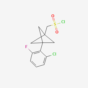 molecular formula C12H11Cl2FO2S B2594157 [3-(2-Chloro-6-fluorophenyl)-1-bicyclo[1.1.1]pentanyl]methanesulfonyl chloride CAS No. 2287314-35-4
