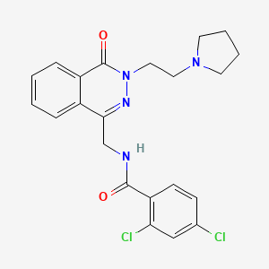 molecular formula C22H22Cl2N4O2 B2594906 2,4-dichloro-N-((4-oxo-3-(2-(pyrrolidin-1-yl)ethyl)-3,4-dihydrophthalazin-1-yl)methyl)benzamide CAS No. 1428350-15-5