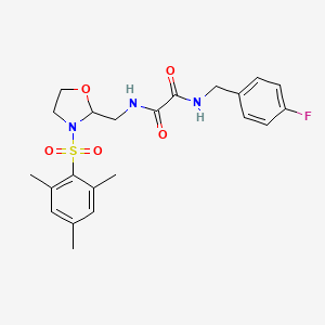 N1-(4-fluorobenzyl)-N2-((3-(mesitylsulfonyl)oxazolidin-2-yl)methyl)oxalamide
