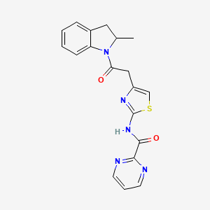 molecular formula C19H17N5O2S B2595045 N-(4-(2-(2-metilindolin-1-il)-2-oxoethyl)tiazol-2-il)pirimidina-2-carboxamida CAS No. 1286716-88-8