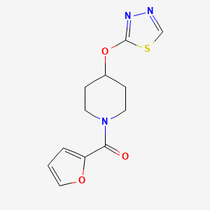 (4-((1,3,4-Thiadiazol-2-yl)oxy)piperidin-1-yl)(furan-2-yl)methanone