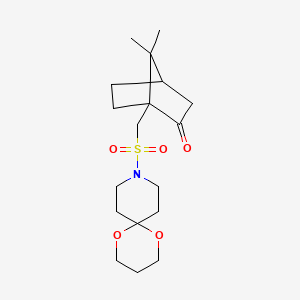 B2595719 1-((1,5-Dioxa-9-azaspiro[5.5]undecan-9-ylsulfonyl)methyl)-7,7-dimethylbicyclo[2.2.1]heptan-2-one CAS No. 1797309-29-5