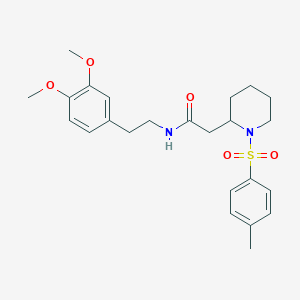 B2596315 N-(3,4-dimethoxyphenethyl)-2-(1-tosylpiperidin-2-yl)acetamide CAS No. 941955-17-5