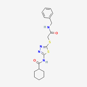 molecular formula C18H22N4O2S2 B2598552 N-[5-[2-(苯甲氨基)-2-氧代乙基]硫代-1,3,4-噻二唑-2-基]环己烷甲酰胺 CAS No. 604747-34-4